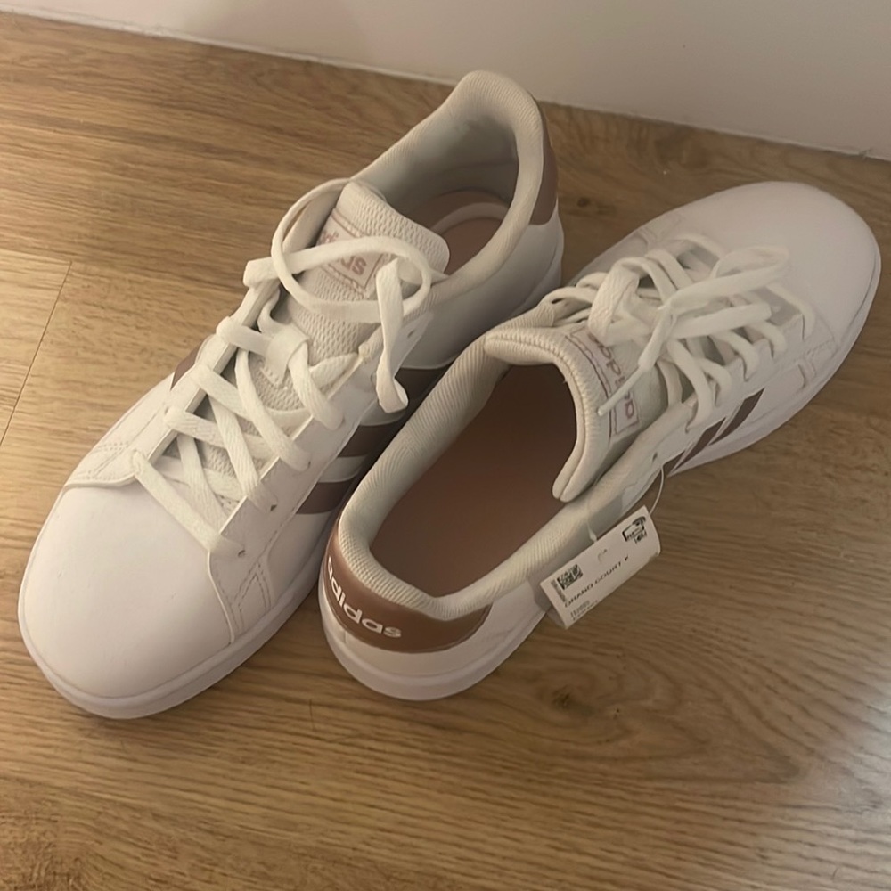 Brand new rose gold Addidas